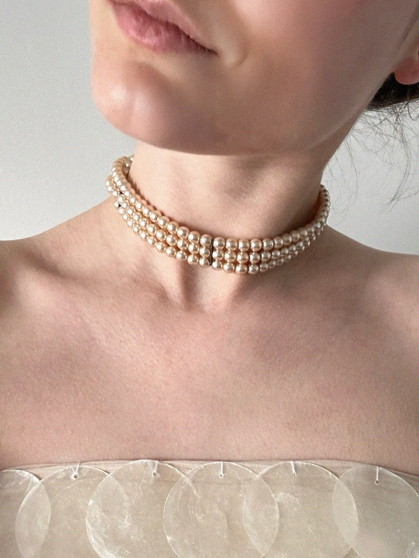 Three-row pearl necklace