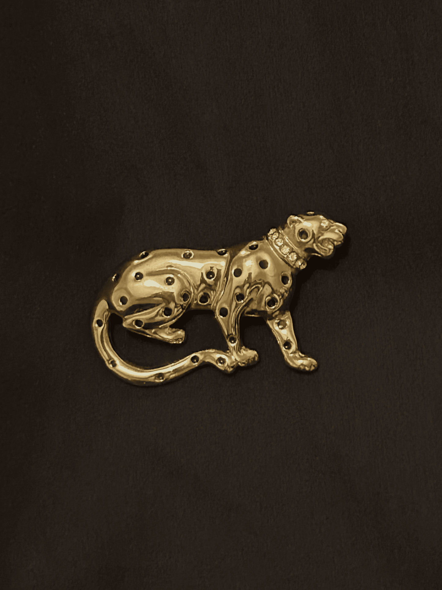 A vintage panther brooch