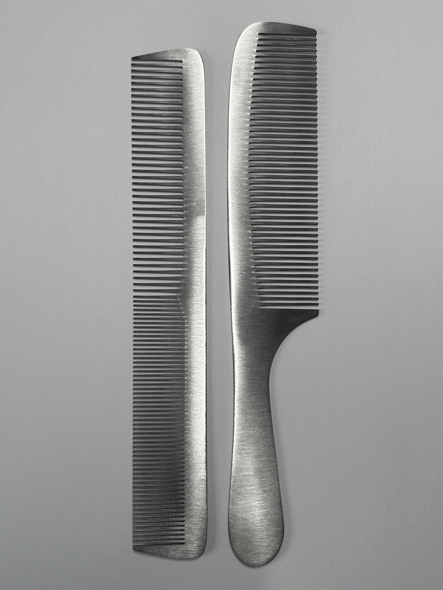 Set of two silver comb