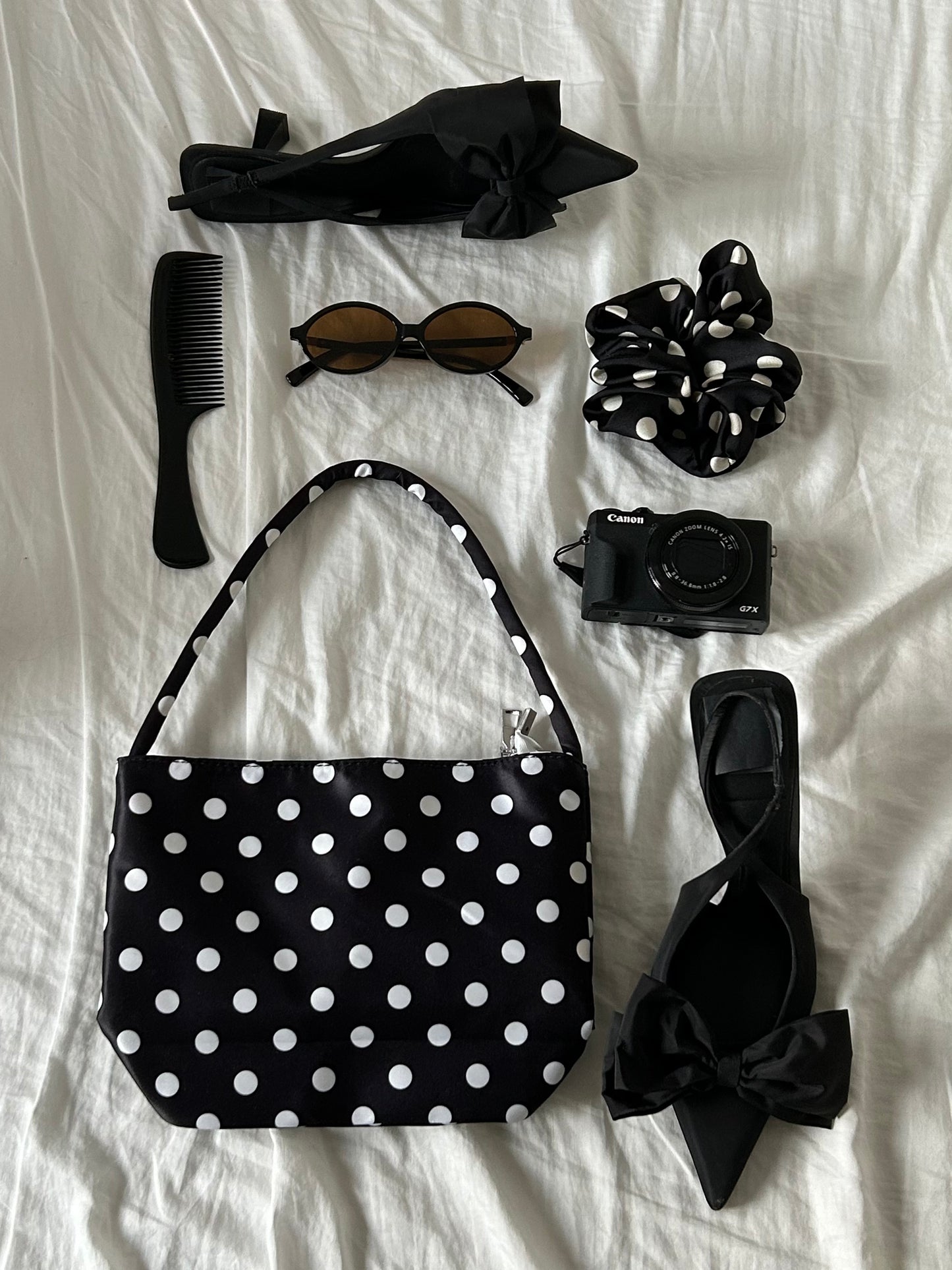 A Polka Dots Black Handbag