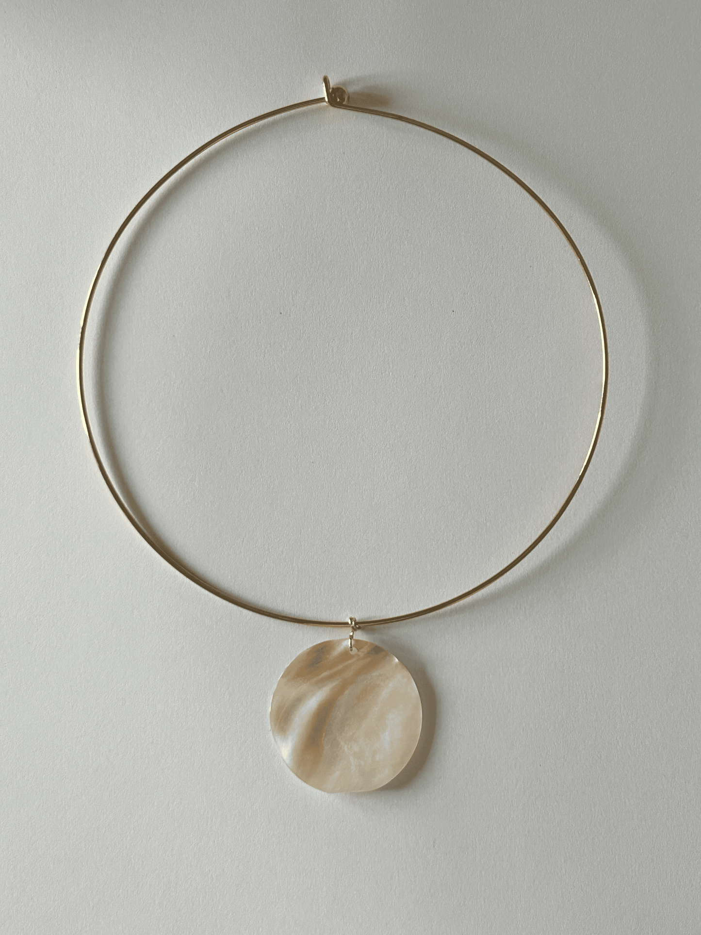 Mother of pearl necklace.