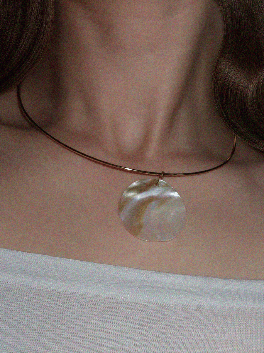 Mother of pearl necklace.
