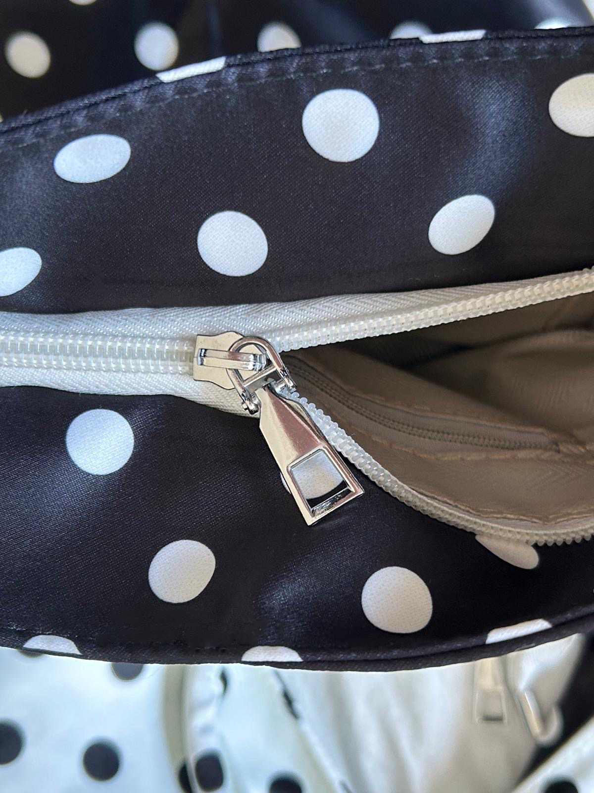 A Polka Dots Black Handbag