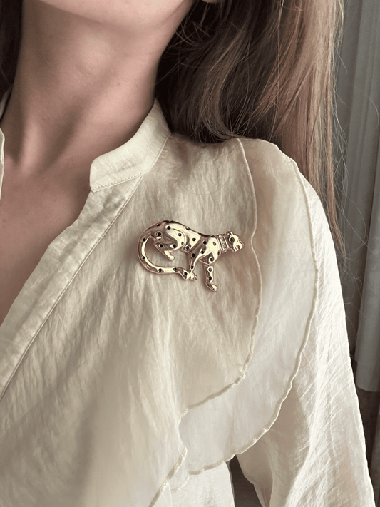 A vintage panther brooch