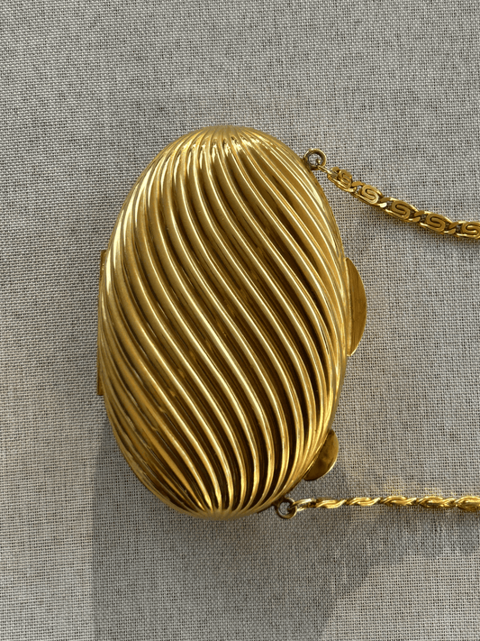 Mini 70s Ribbed Gold Oval Clutch