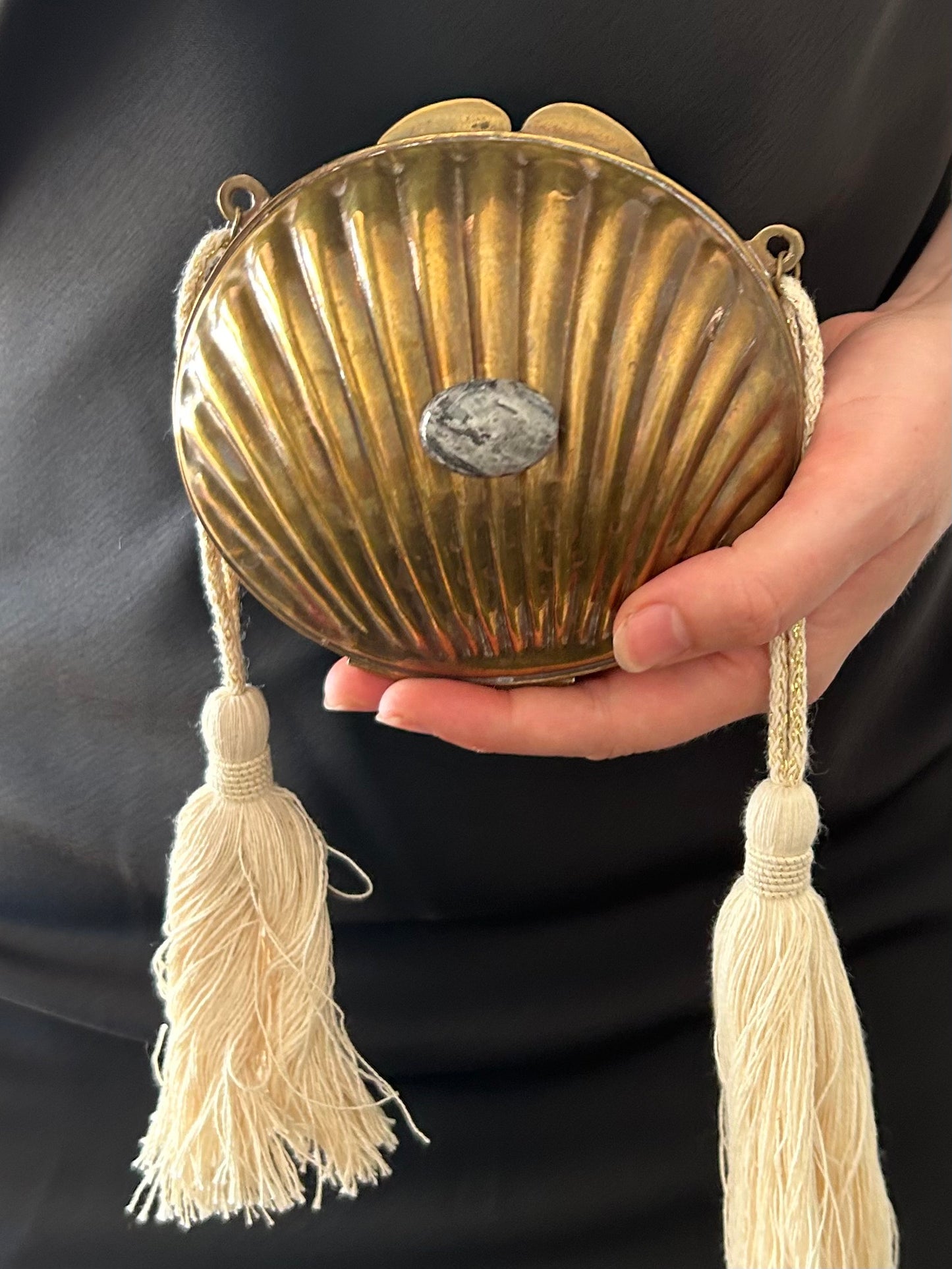 A Beige Tasseled Sculptural Clutch