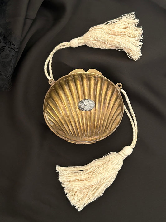 A Beige Tasseled Sculptural Clutch