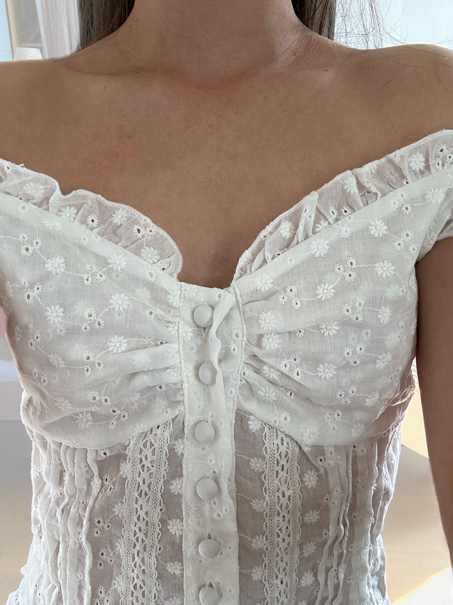 A Ruffle Button Top