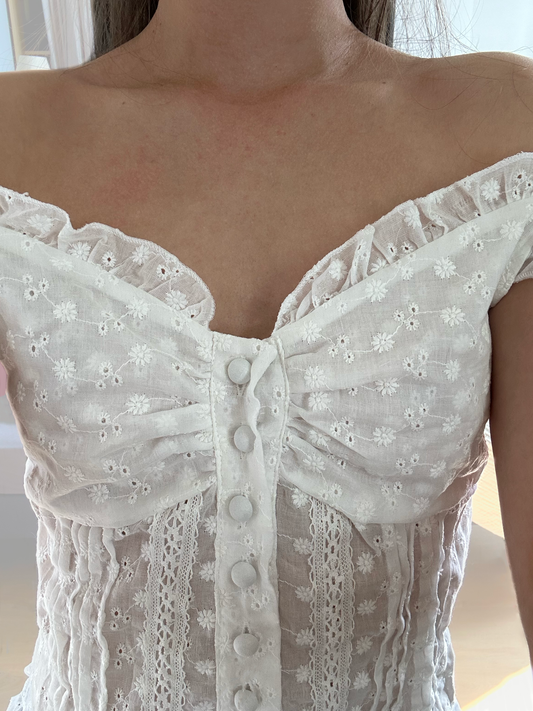 A Ruffle Button Top